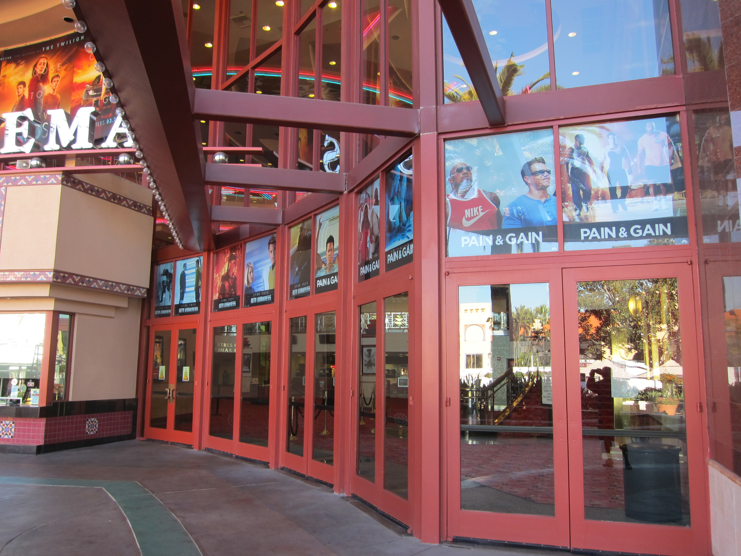 PAIN AND GAIN double-sided colorful photo boards at the Regal Irvine Spectrum Theatre in Southern California viewed from outside the theatre.