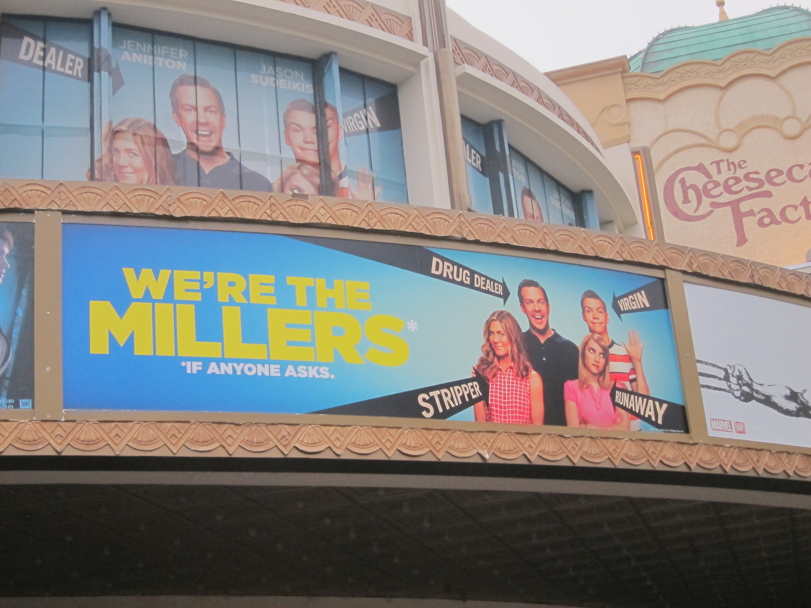 Custom marquee for WE'RE THE MILLERS at The Grove Theatre in Southern California.  Note the special window graphics above the custom marquee.