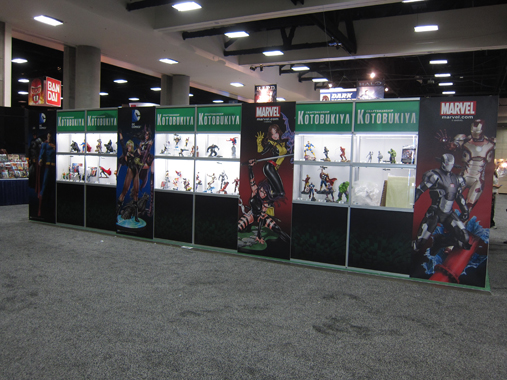 The outsides of the booth (including the back) incorporates printed graphics and acrylic display cases.