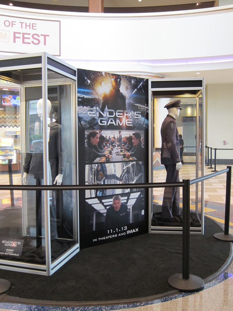 Another angle of the ENDER'S GAME costume exhibit at the Regal LA Live Theatre.
