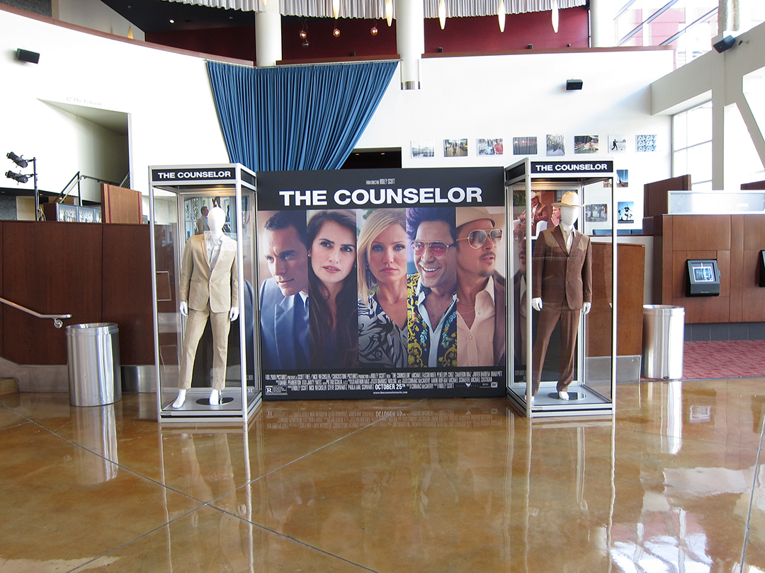 Distant shot of THE COUNSELOR costume in the lobby of the ArcLight Hollywood.